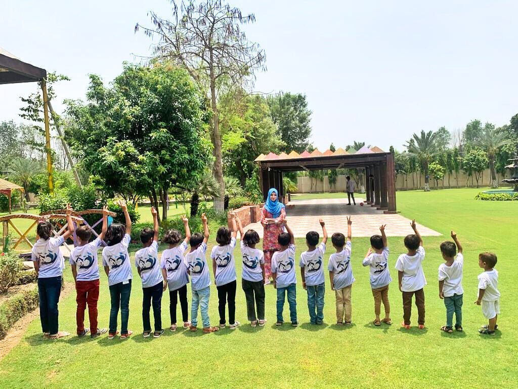 Children of Sibel Care Home wearing Sibel Welfare t-shirts